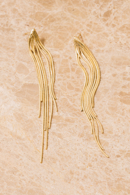 gold chain fringe earrings above view