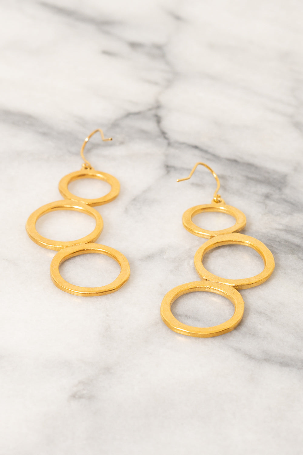 gold circle dangle earrings Janna Conner