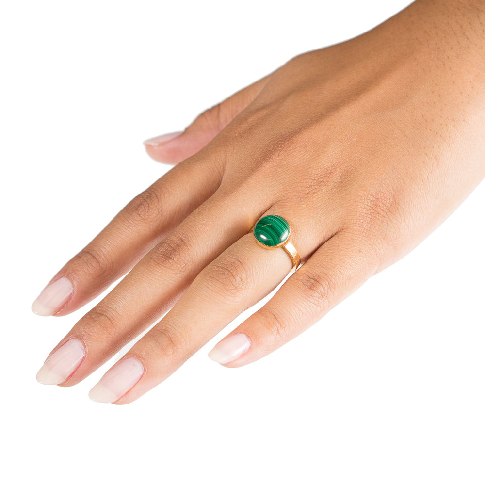 malachite ring on hand