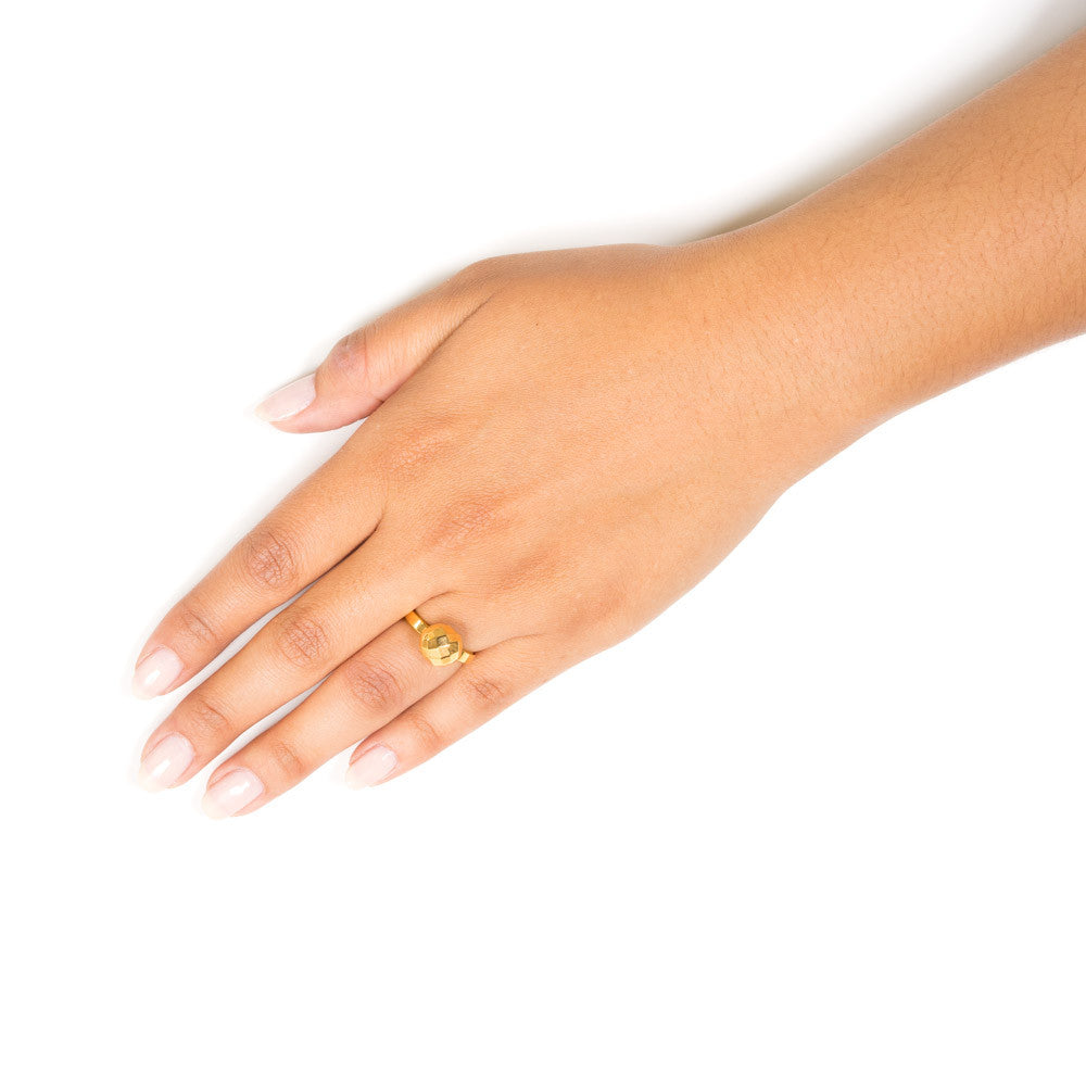 gold ball ring on model hand