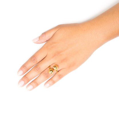 gold disco ball wraparound ring on hand