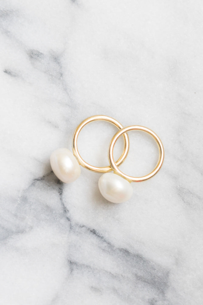 pearl lollipop 14k gold rings on marble janna conner