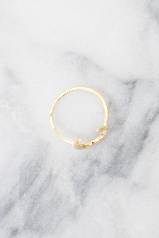 top view of gold crescent moon ring