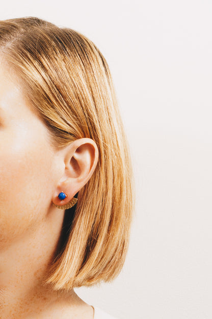 blue ear jacket earrings on model