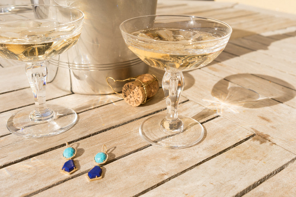 rose cut sleeping beauty turquoise and lapis diamond pave earrings janna Conner with champagne glasses