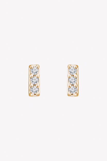 14k gold diamond bar earrings closeup