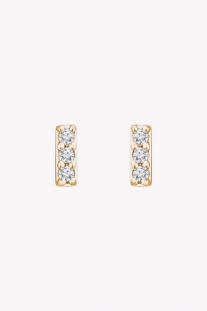 14k gold diamond bar earrings closeup