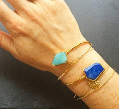 Peruvian Opal and lapis adjustable cuff on hand