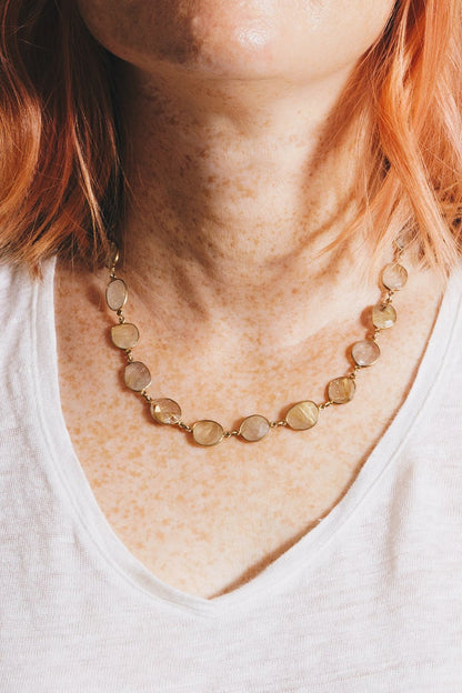 rutilated quartz necklace on model